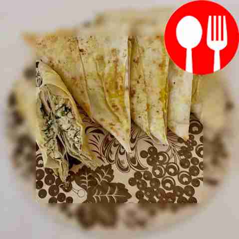 Lavash pies with cottage cheese and herbs in a frying pan