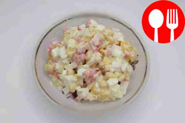 Unusual salad of crab sticks and orange