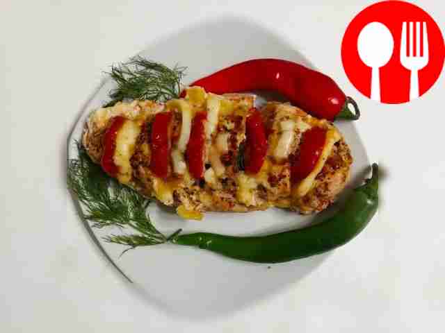 Tender duck fillet with tomatoes and mozzarella cheese