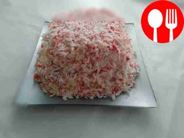 Salad with crab sticks, prunes and nuts