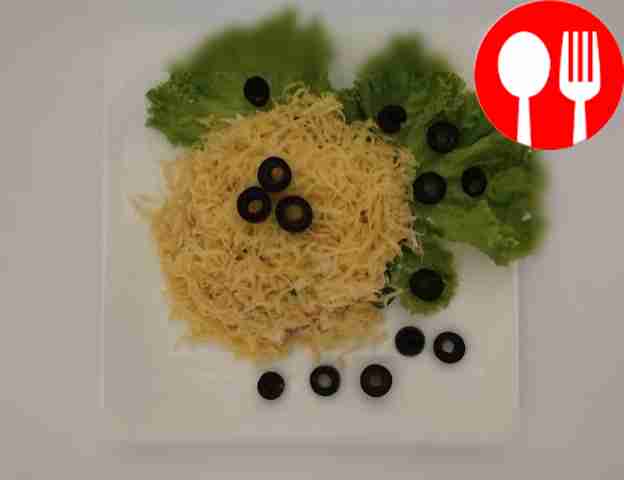 Festive salad with crab sticks and pickled mushrooms