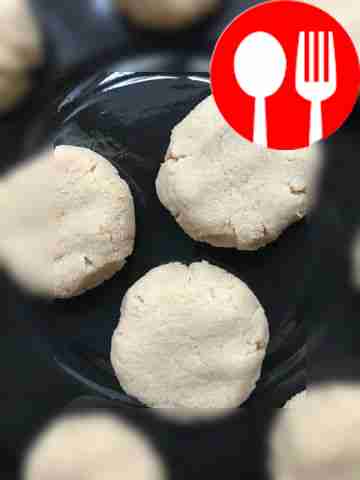 Place future cookies on parchment and press...