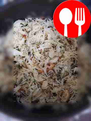 Quick noodles with meat in a frying pan