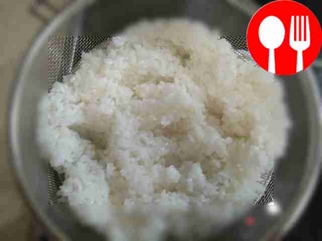 Boil the rice in salted water until half cooked.