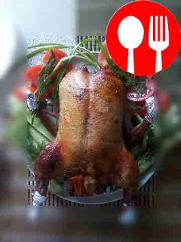 Duck with apple and orange