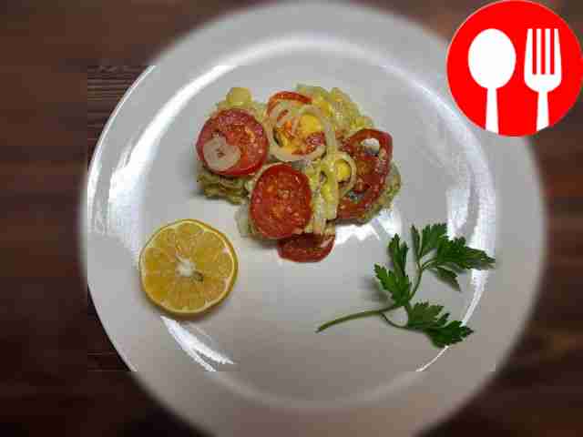 Baked hake with tomatoes and cheese
