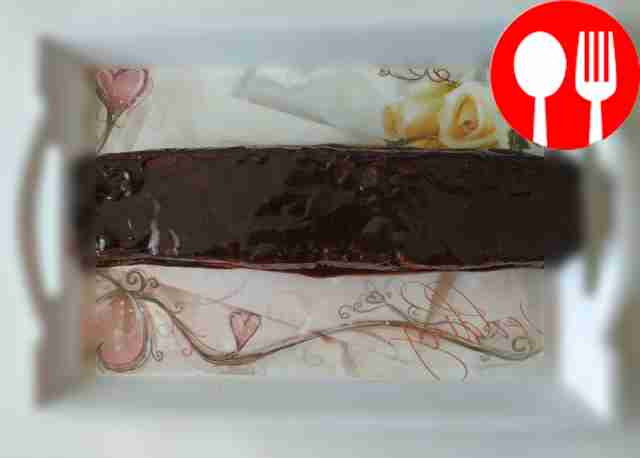 Prepare chocolate frosting according to...