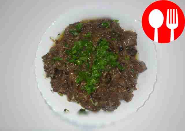 Appetizing liver fried in a frying pan