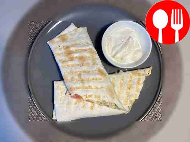 Appetizing shawarma with pickled cucumber