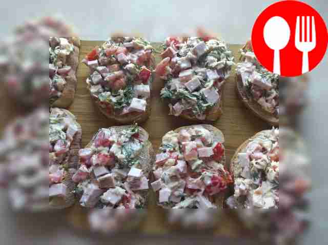 Slice the loaf and add the filling of tomato,...