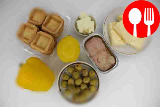 Open a can of cod liver. Wash the lemon and...