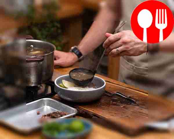 To serve Pho Bo, pour hot soup into a soup...