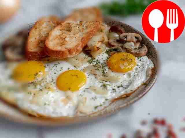 Hearty scrambled eggs with mushrooms