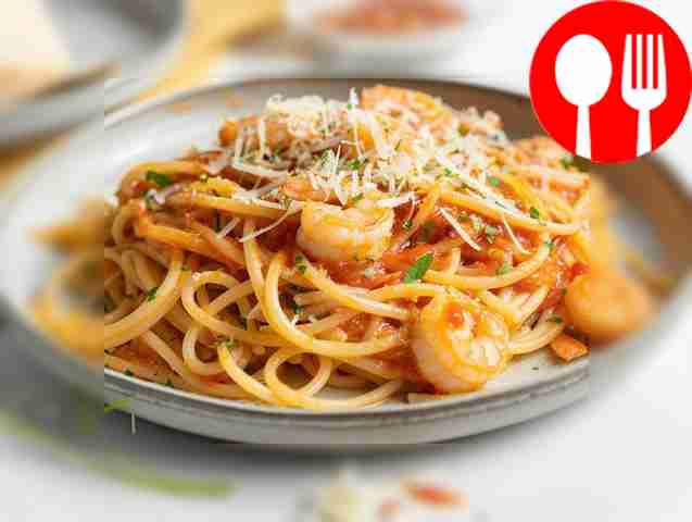 Appetizing shrimp with paste in tomato