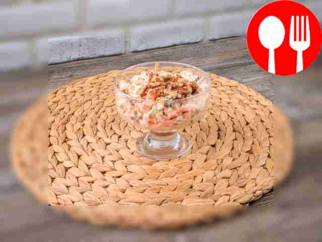 Salad with carrots, cottage cheese and dried fruits