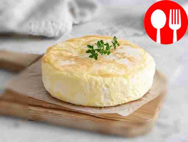 Healthy omelet with milk in a double boiler