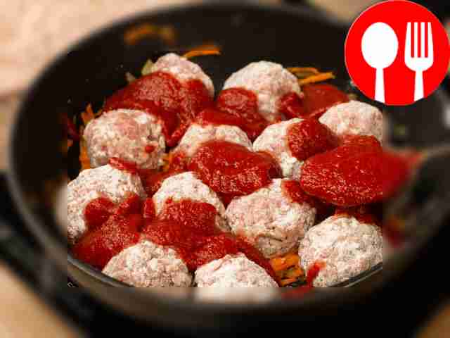Pour tomato paste over the meatballs, add salt...