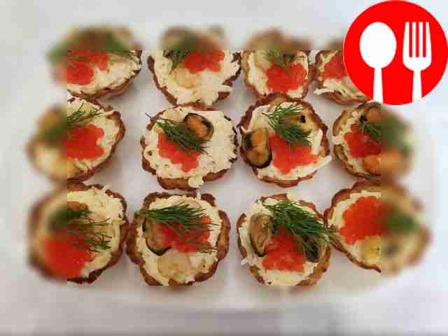 Appetizing potato tartlets with seafood