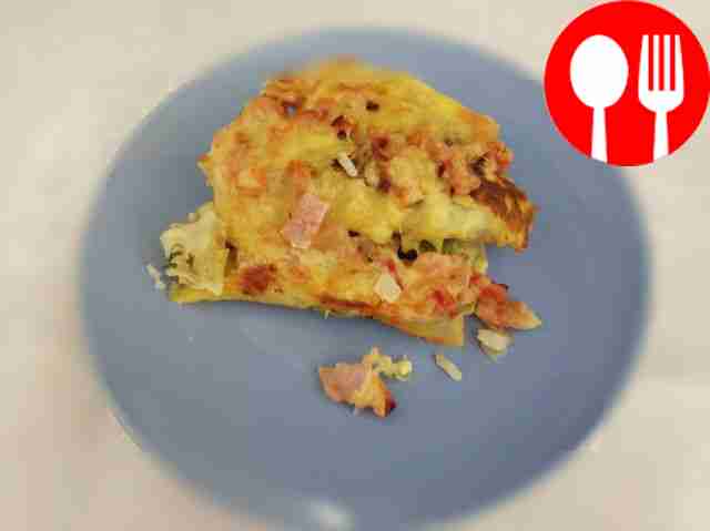 Stuffed baked pancakes with cheese and ham