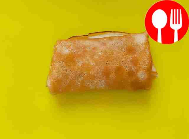 Homemade pancakes with chicken and mushrooms