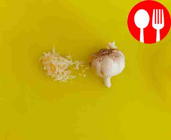 Peel and press the garlic and add to the pan...