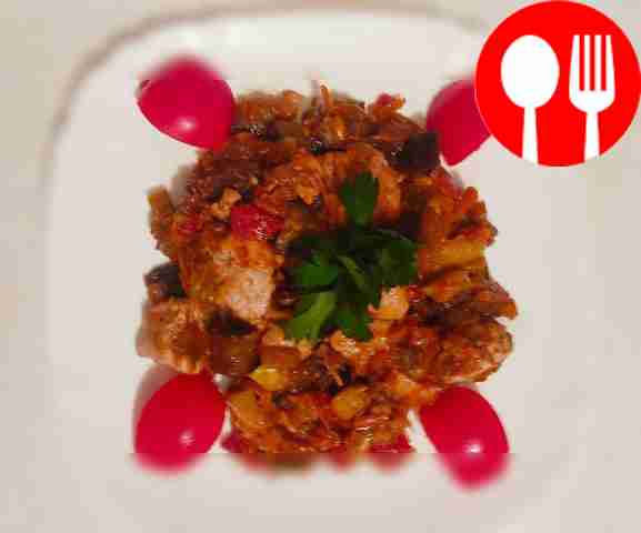 Serve the dish hot with tomato slices and...