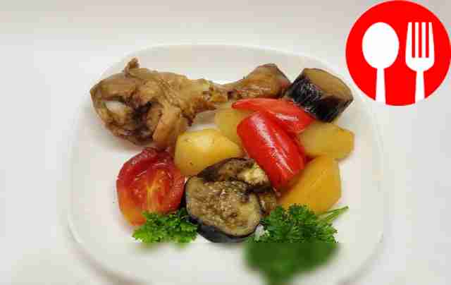 Appetizing chicken legs with vegetables