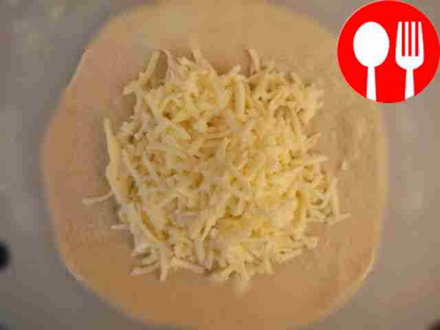 Gather the dough into a knot and roll it out.