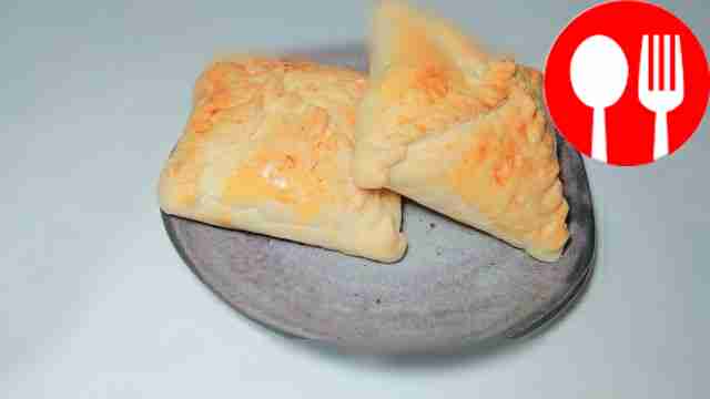 Serve the pies, garnish the dish with fresh...