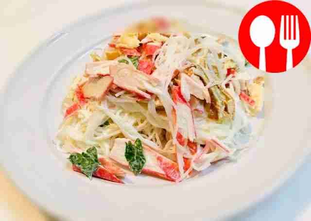 Salad of rice noodles, egg pancakes and crab sticks
