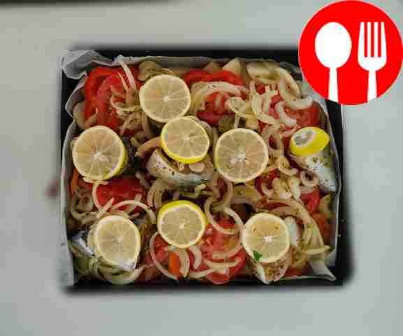 Place peppers, tomatoes, fish and lemon on top...