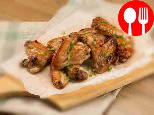 Bake the wings for 15 minutes, then flip,...