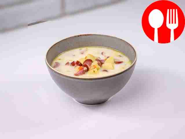Cheese soup with hunting sausages