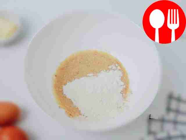 Add flour and mix ingredients.