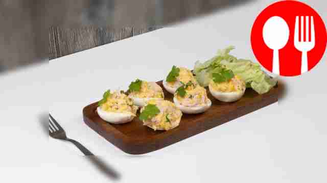Eggs stuffed with ham and cheese