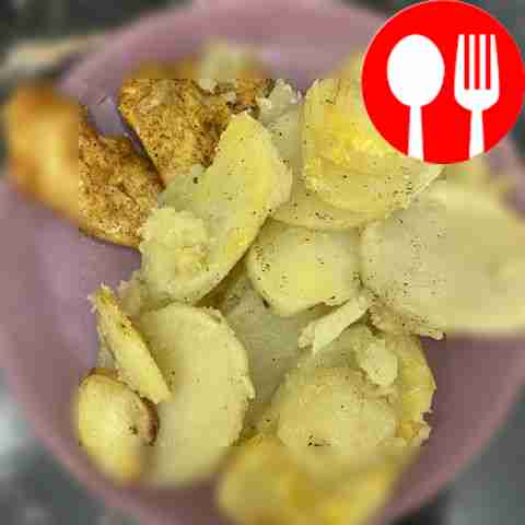 Potatoes with chicken in a cooking bag