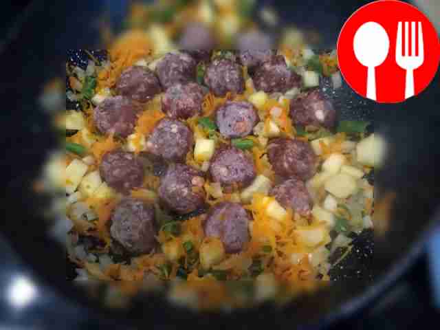Place the meat balls in the pan, pressing them...
