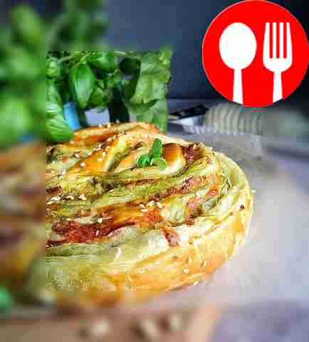 Snail with pesto sauce and cheese