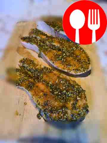 Brush the fish steak with your favorite...