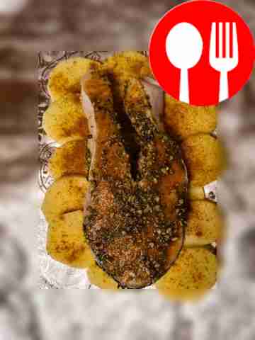 Place the steak on top of the potatoes.