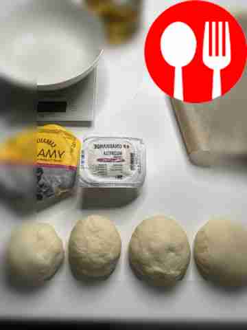 Энергично обомните тесто и разделите его на...