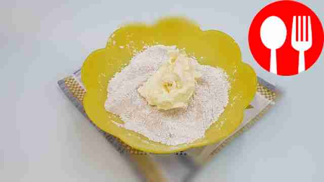 Add soft butter to the dry mixture. Using your...