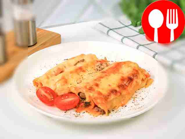 Cannelloni with minced meat and mushrooms