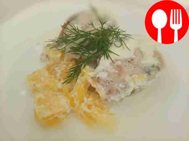 Unusual fish with oranges in cream