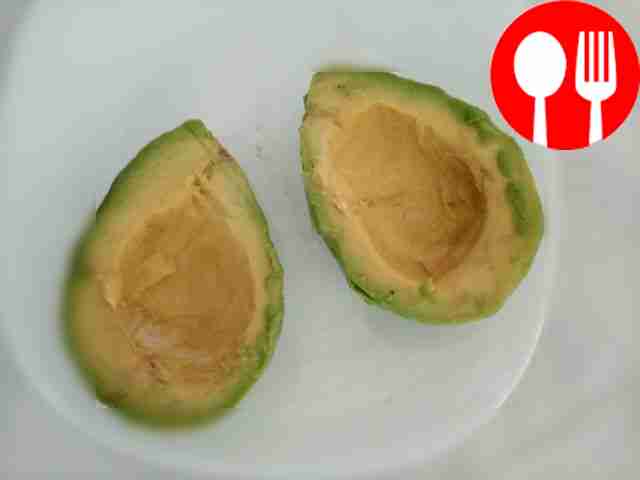 Cut the avocado lengthwise into 2 parts and...