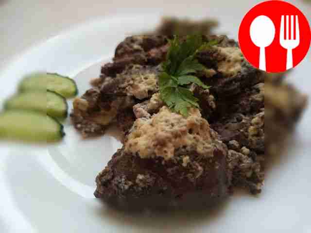 Tender liver in cream in a frying pan