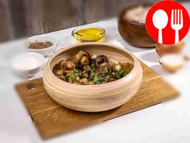 Champignons fried with onions