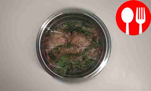 Cut the lemon into thin slices straight with...