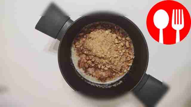 Place crushed cookies and sugar in heated milk...