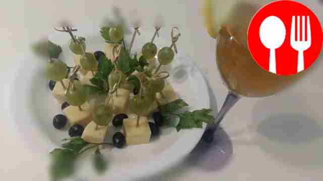 Canapes with cheese and grapes